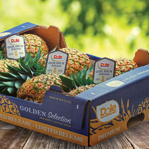 Dole golden selection pineapples on a cartor